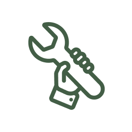 Hand holding a spanner